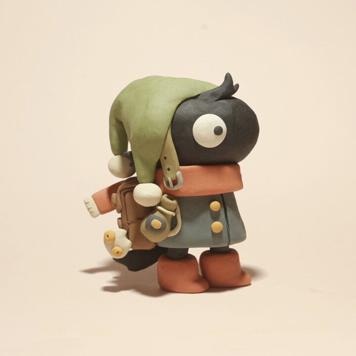 Clay Charater Image of a little clay charater looking to the right
